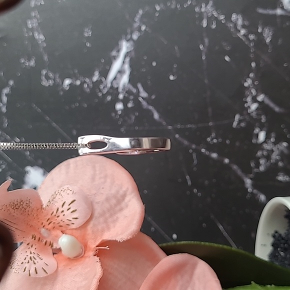 14KT WHITE GOLD TENSION SET DIAMOND PENDANT - Picture 3 of 13